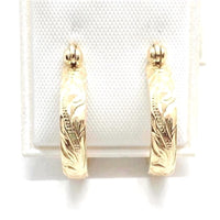 Gold hawaiian scroll earrings
