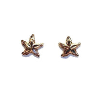 Gold star fish earring