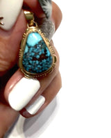 
              Gold turquoise pendant
            