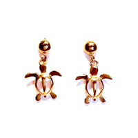 Gold honu shape earring